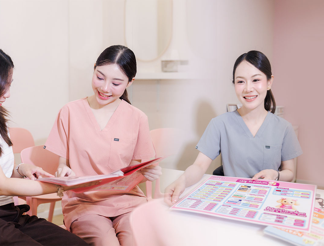 Xpress Clinic staff going through the treatment menu with a guest