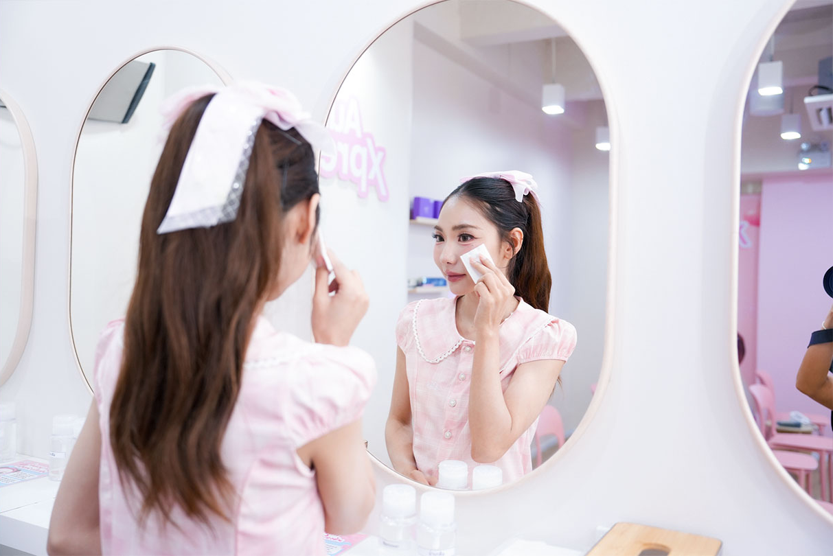 Guest preparing for a treatment at an Xpress Clinic mirror station