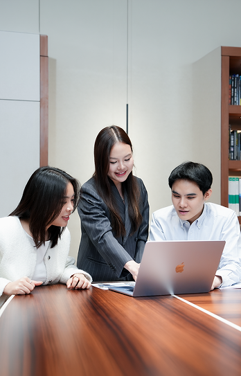 Team working together at a laptop
