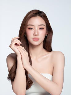 A woman touching her face